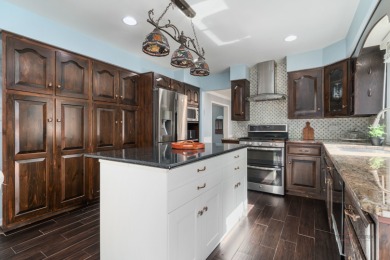Welcome to this exceptional 5-bedroom, 4.1-bathroom residence on Hillcrest Country Club in Illinois - for sale on GolfHomes.com, golf home, golf lot