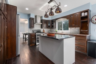 Welcome to this exceptional 5-bedroom, 4.1-bathroom residence on Hillcrest Country Club in Illinois - for sale on GolfHomes.com, golf home, golf lot