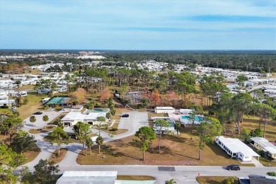 Holiday Park: A 55+ GATED COMMUNITY. CORNER LOT IN A CUL-DE-SAC on Sabal Trace Golf and Country Club in Florida - for sale on GolfHomes.com, golf home, golf lot