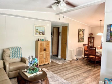 This well-maintained two-bedroom, two-bathroom residence offers on Pine Lakes Country Club in Florida - for sale on GolfHomes.com, golf home, golf lot