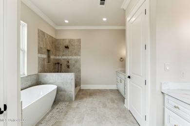 Discover your dream home just a 3 minute ride from the beach and on The Bridges Golf Club At Hollywood Casino in Mississippi - for sale on GolfHomes.com, golf home, golf lot