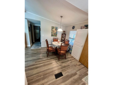 This well-maintained two-bedroom, two-bathroom residence offers on Pine Lakes Country Club in Florida - for sale on GolfHomes.com, golf home, golf lot