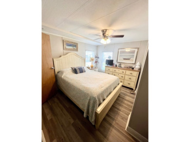 This well-maintained two-bedroom, two-bathroom residence offers on Pine Lakes Country Club in Florida - for sale on GolfHomes.com, golf home, golf lot