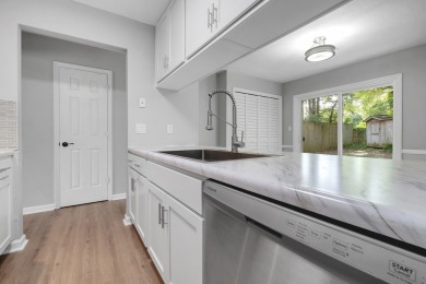 Nestled at the top of a quiet street off of Hilaman Golf Course on Hilaman Park Golf Course in Florida - for sale on GolfHomes.com, golf home, golf lot