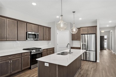 JP Brooks proudly presents the Waterford Villa with the upgraded on Sanbrook Golf Course in Minnesota - for sale on GolfHomes.com, golf home, golf lot