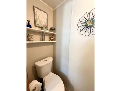 This well-maintained two-bedroom, two-bathroom residence offers on Pine Lakes Country Club in Florida - for sale on GolfHomes.com, golf home, golf lot