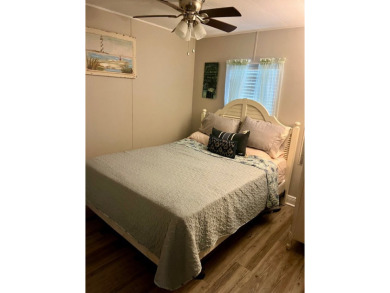 This well-maintained two-bedroom, two-bathroom residence offers on Pine Lakes Country Club in Florida - for sale on GolfHomes.com, golf home, golf lot