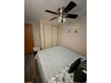 This well-maintained two-bedroom, two-bathroom residence offers on Pine Lakes Country Club in Florida - for sale on GolfHomes.com, golf home, golf lot