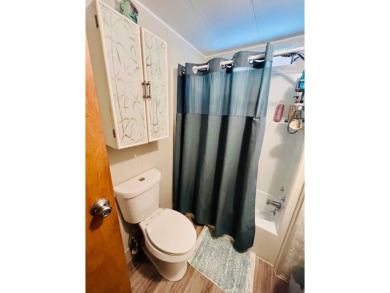 This well-maintained two-bedroom, two-bathroom residence offers on Pine Lakes Country Club in Florida - for sale on GolfHomes.com, golf home, golf lot