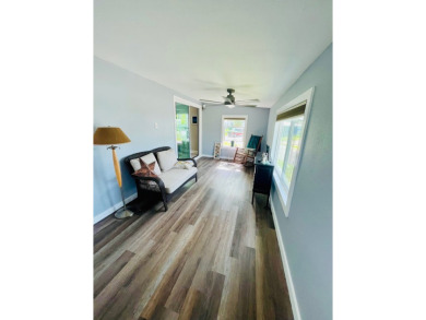 This well-maintained two-bedroom, two-bathroom residence offers on Pine Lakes Country Club in Florida - for sale on GolfHomes.com, golf home, golf lot