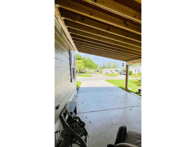 This well-maintained two-bedroom, two-bathroom residence offers on Pine Lakes Country Club in Florida - for sale on GolfHomes.com, golf home, golf lot