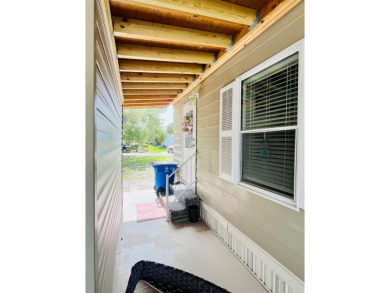 This well-maintained two-bedroom, two-bathroom residence offers on Pine Lakes Country Club in Florida - for sale on GolfHomes.com, golf home, golf lot