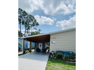 This well-maintained two-bedroom, two-bathroom residence offers on Pine Lakes Country Club in Florida - for sale on GolfHomes.com, golf home, golf lot