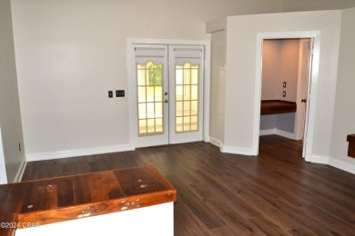 CURRENTLY UNDER CONTRACT, SELLER WILL CONSIDER BACKUP OFFERS on Holiday Golf Club in Florida - for sale on GolfHomes.com, golf home, golf lot