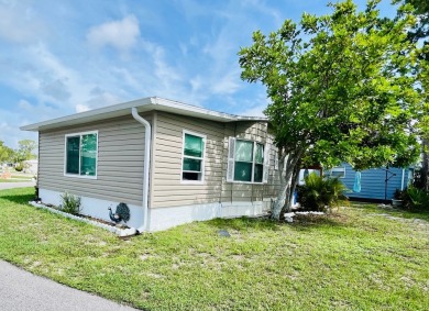This well-maintained two-bedroom, two-bathroom residence offers on Pine Lakes Country Club in Florida - for sale on GolfHomes.com, golf home, golf lot