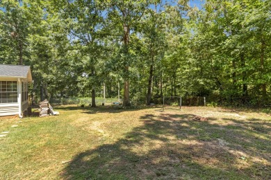 Welcome to 200 Victoria Drive, a beautifully updated 3-bedroom on Woodfin Ridge Golf Club in South Carolina - for sale on GolfHomes.com, golf home, golf lot