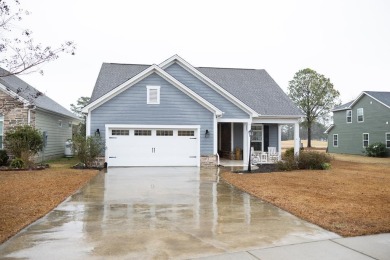 Discover this stunning home in Gregory Point, nestled within the on Players Course At Wyboo Plantation in South Carolina - for sale on GolfHomes.com, golf home, golf lot