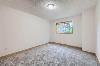 his beautifully maintained mid-unit townhome offers the perfect on Valleywood Golf Course in Minnesota - for sale on GolfHomes.com, golf home, golf lot