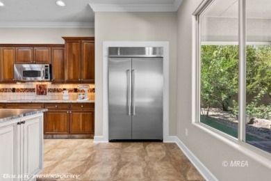 Escape to luxury living in this stunning Sun City Mesquite home! on Conestoga Golf Club in Nevada - for sale on GolfHomes.com, golf home, golf lot