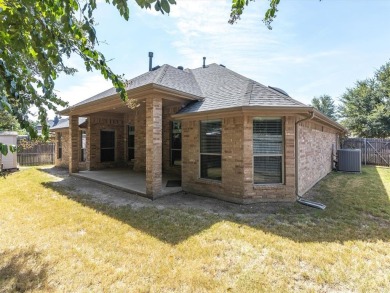 This beautiful one-owner home in Benbrook is nestled across from on Whitestone Golf Club in Texas - for sale on GolfHomes.com, golf home, golf lot