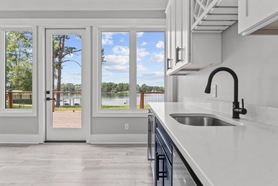 STUNNING MODERN LAKEFRONT HOME ON LAKE SINCLAIR! This sleek and on Milledgeville Country Club in Georgia - for sale on GolfHomes.com, golf home, golf lot