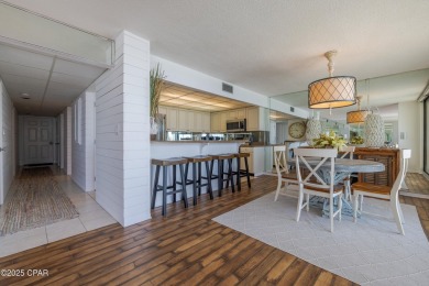 Experience a coastal lifestyle in this stunning two-bedroom on Edgewater Beach Resort in Florida - for sale on GolfHomes.com, golf home, golf lot