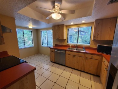 Very desirable first floor, end unit with one of the most on IMG Academies Golf and Country Club in Florida - for sale on GolfHomes.com, golf home, golf lot