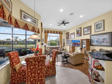 Beautifully designed and ideally situated on the lake, this on PGA Golf Club in PGA Village in Florida - for sale on GolfHomes.com, golf home, golf lot