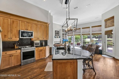 Totally updated pool home with spectacular views across the pond on Jacksonville Golf and Country Club in Florida - for sale on GolfHomes.com, golf home, golf lot