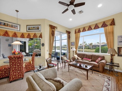 Beautifully designed and ideally situated on the lake, this on PGA Golf Club in PGA Village in Florida - for sale on GolfHomes.com, golf home, golf lot