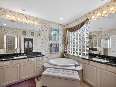 Beautifully designed and ideally situated on the lake, this on PGA Golf Club in PGA Village in Florida - for sale on GolfHomes.com, golf home, golf lot