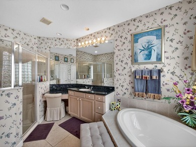 Beautifully designed and ideally situated on the lake, this on PGA Golf Club in PGA Village in Florida - for sale on GolfHomes.com, golf home, golf lot