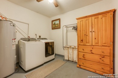 Welcome to your dream home in a quiet neighborhood just a on Devine Golf Course in Texas - for sale on GolfHomes.com, golf home, golf lot