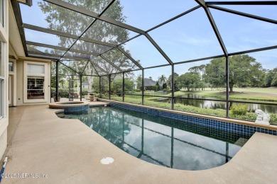 Totally updated pool home with spectacular views across the pond on Jacksonville Golf and Country Club in Florida - for sale on GolfHomes.com, golf home, golf lot