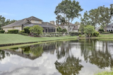 Totally updated pool home with spectacular views across the pond on Jacksonville Golf and Country Club in Florida - for sale on GolfHomes.com, golf home, golf lot
