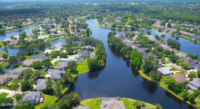 Totally updated pool home with spectacular views across the pond on Jacksonville Golf and Country Club in Florida - for sale on GolfHomes.com, golf home, golf lot