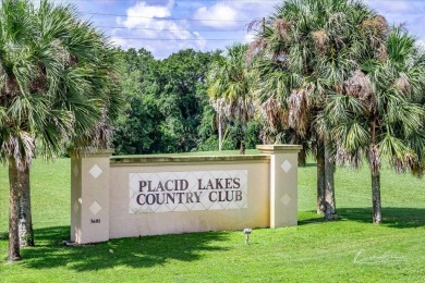 HOME SWEET HOME!  This truly exceptional LAKEFRONT property on Placid Lakes Country Club in Florida - for sale on GolfHomes.com, golf home, golf lot