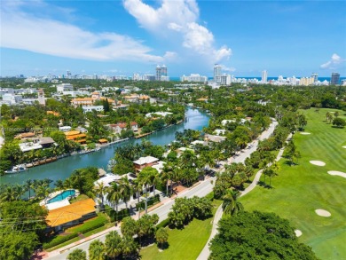 OVERSIZED WATERFRONT HOME WITH 80FT OF WATERFRONTAGE & GOLF on Miami Beach Golf Club in Florida - for sale on GolfHomes.com, golf home, golf lot