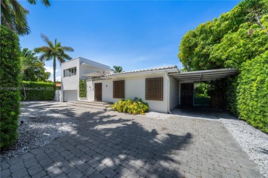 OVERSIZED WATERFRONT HOME WITH 80FT OF WATERFRONTAGE & GOLF on Miami Beach Golf Club in Florida - for sale on GolfHomes.com, golf home, golf lot