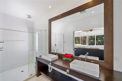 OVERSIZED WATERFRONT HOME WITH 80FT OF WATERFRONTAGE & GOLF on Miami Beach Golf Club in Florida - for sale on GolfHomes.com, golf home, golf lot