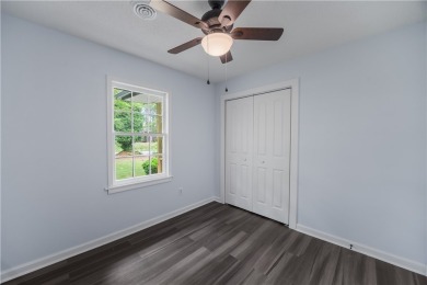 Great house with lots of space and 4 bedrooms. Home has a split on Cobbs Glen Country Club in South Carolina - for sale on GolfHomes.com, golf home, golf lot