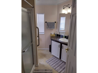 This Immaculate 1260 sq ft home features two bedroom and two on Four Lakes Golf Club in Florida - for sale on GolfHomes.com, golf home, golf lot