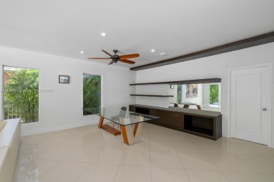 OVERSIZED WATERFRONT HOME WITH 80FT OF WATERFRONTAGE & GOLF on Miami Beach Golf Club in Florida - for sale on GolfHomes.com, golf home, golf lot