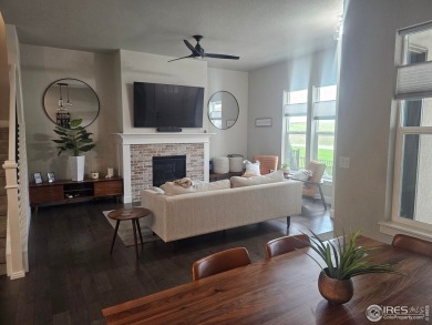 This beautiful 4 bed, 3.5 bath townhome offers lakefront living on Highland Meadows Golf Course in Colorado - for sale on GolfHomes.com, golf home, golf lot