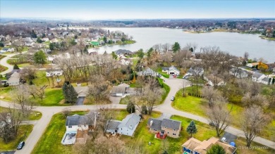 This stunning home is packed with updates and offers a lifestyle on Savannah Oaks Golf Club of Candlewick Lake in Illinois - for sale on GolfHomes.com, golf home, golf lot