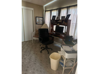 Spacious Corner Lot Gem: Furnished 2-Bedroom Palm Harbor Home on Schalamar Creek Golf and Country Club in Florida - for sale on GolfHomes.com, golf home, golf lot