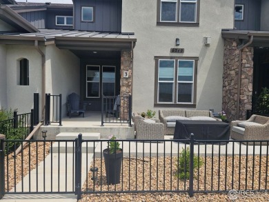 This beautiful 4 bed, 3.5 bath townhome offers lakefront living on Highland Meadows Golf Course in Colorado - for sale on GolfHomes.com, golf home, golf lot