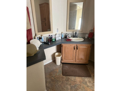 Spacious Corner Lot Gem: Furnished 2-Bedroom Palm Harbor Home on Schalamar Creek Golf and Country Club in Florida - for sale on GolfHomes.com, golf home, golf lot