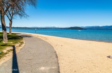 Charming 2-bedroom, 2-bath cottage nestled in a peaceful on Sandpoint Elks Golf Course in Idaho - for sale on GolfHomes.com, golf home, golf lot