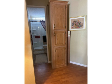 Spacious Corner Lot Gem: Furnished 2-Bedroom Palm Harbor Home on Schalamar Creek Golf and Country Club in Florida - for sale on GolfHomes.com, golf home, golf lot